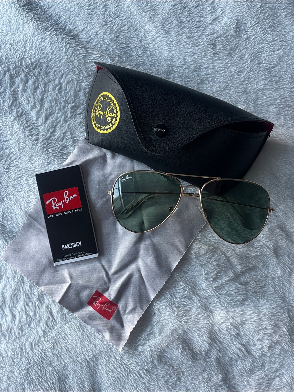 Ray-Ban's Gold Aviator Sunglasses with Green Lenses